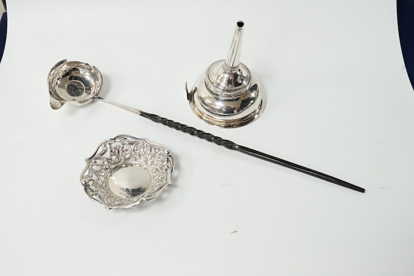 A George III silver wine funnel, by Peter & Ann Bateman, London, 1792, 12.6cm, no muslin ring, a punch ladle(a.f.) and a pierced silver bonbon dish. Condition poor to fair